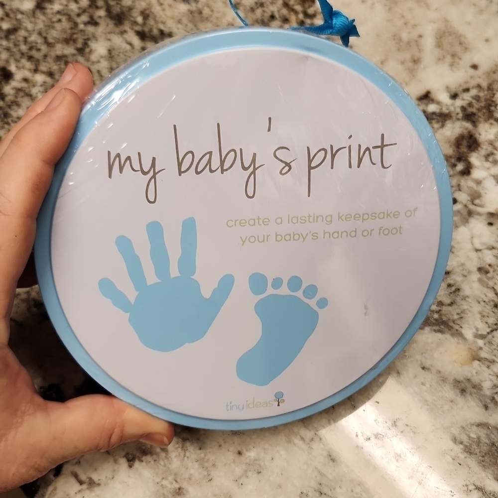 My baby's print new in tin box NWT